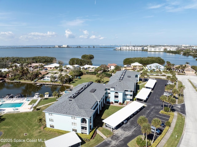 drone / aerial view with a water view