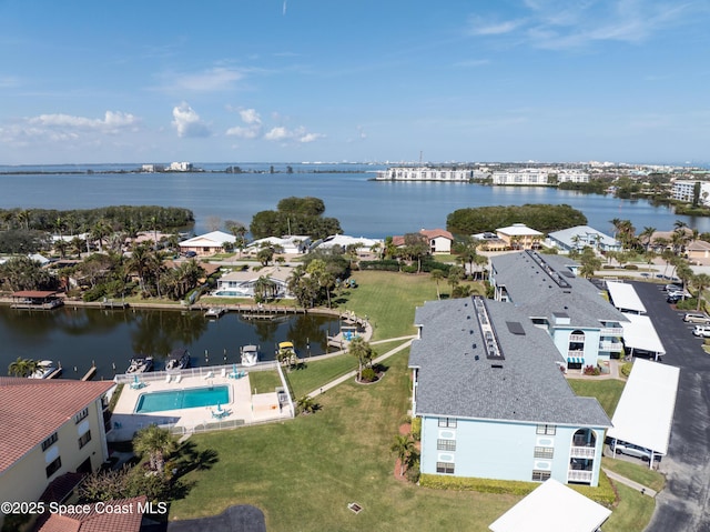 drone / aerial view with a water view