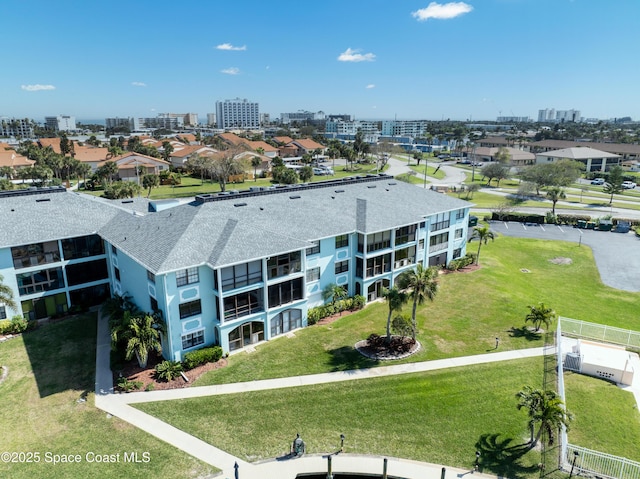 drone / aerial view featuring a city view