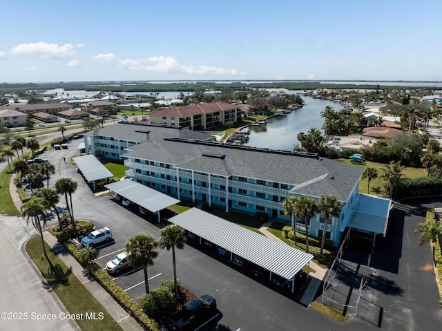 bird's eye view with a water view