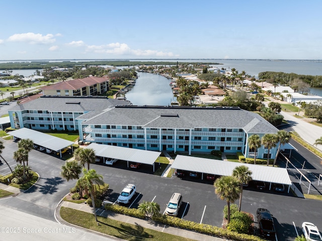 drone / aerial view with a water view