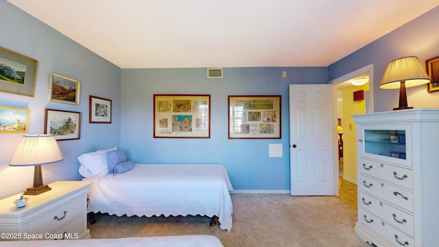1999 S Banana River Blvd Unit 313, Cocoa Beach, FL 32931 - bedroom with light colored carpet and baseboards
