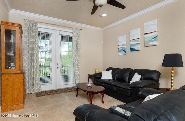 living area with ornamental molding, french doors, and light tile patterned floors