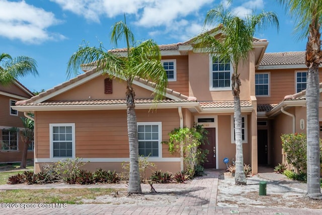 view of front of home with a tiled roof