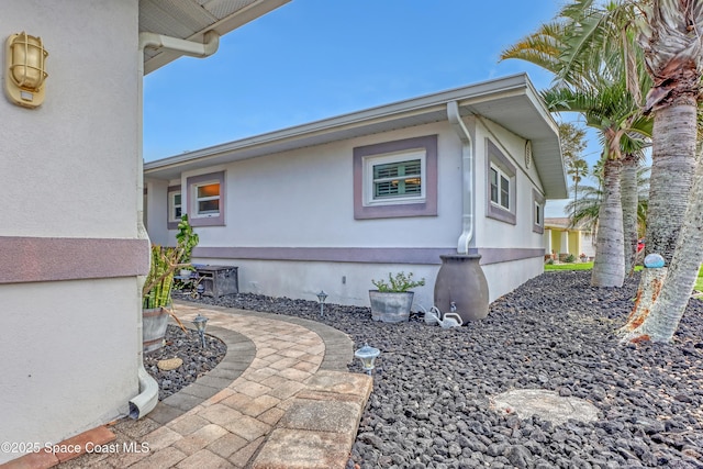 view of home's exterior featuring stucco siding