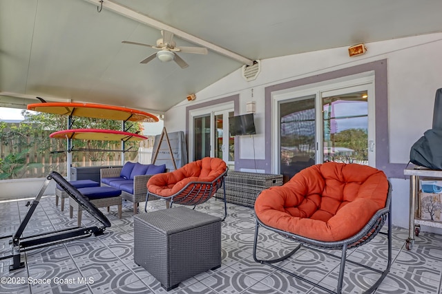 view of patio with a ceiling fan, an outdoor living space, and french doors