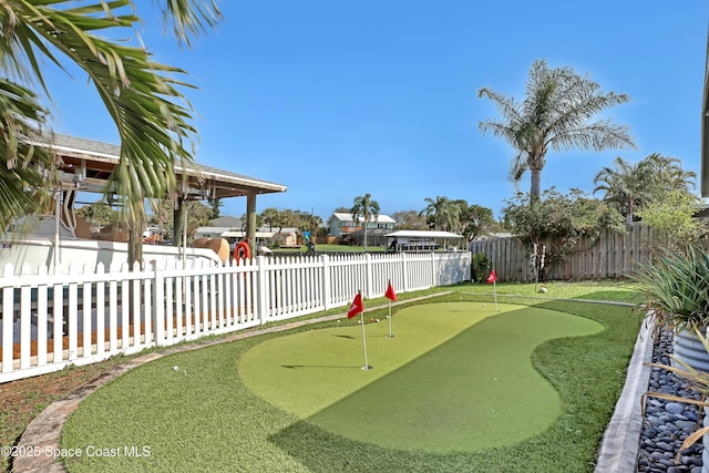 view of community featuring a fenced backyard