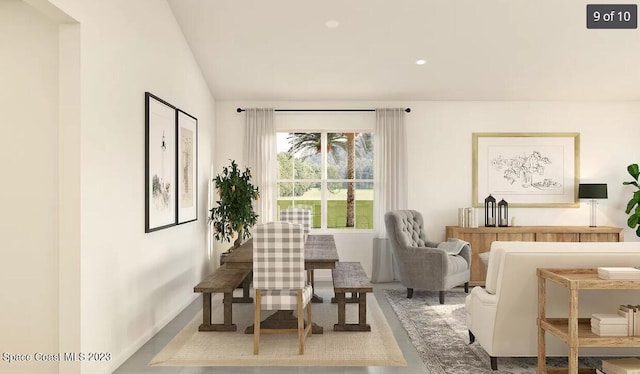 living area with lofted ceiling