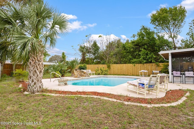 view of swimming pool with a patio area, a fenced backyard, and a fenced in pool