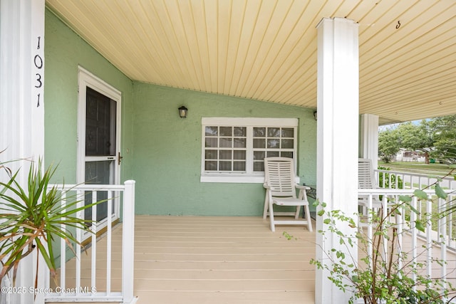 wooden deck with a porch