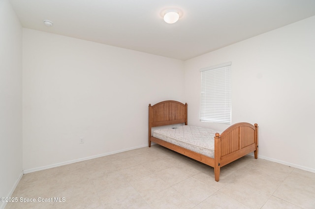 bedroom with baseboards