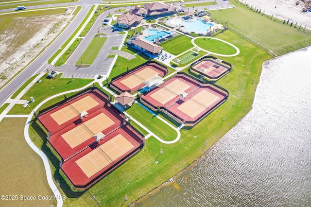 birds eye view of property featuring a water view