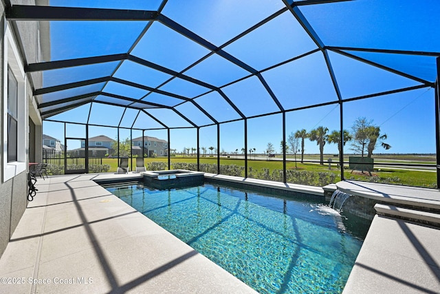 view of swimming pool with a pool with connected hot tub, glass enclosure, and a patio