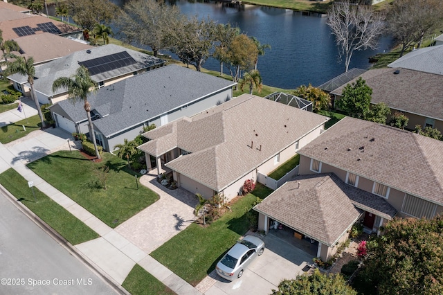 aerial view with a water view and a residential view