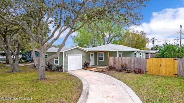 ranch-style house with a garage, a front yard, concrete driveway, and fence