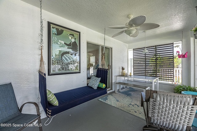 view of patio with ceiling fan