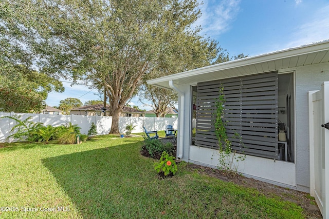 view of yard featuring a fenced backyard