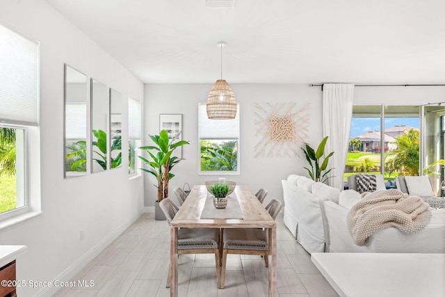 dining space with baseboards