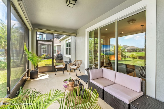 sunroom featuring plenty of natural light