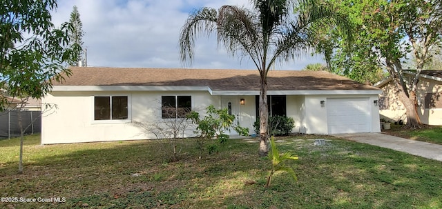 ranch-style house featuring a garage, driveway, a front lawn, and stucco siding