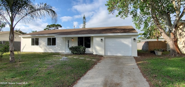 single story home with concrete driveway, fence, an attached garage, and stucco siding