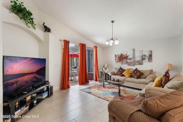 4632 Eagle Peak Dr, Kissimmee, FL 34746 - living room with light tile patterned floors, vaulted ceiling, and a notable chandelier