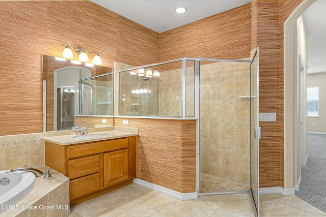 bathroom with vanity, tile patterned flooring, a shower stall, and a bath