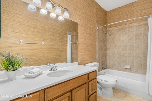 bathroom featuring vanity, tile patterned flooring, toilet, and shower / bathtub combination with curtain