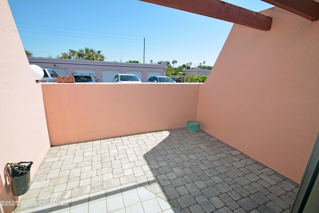 view of patio with a balcony