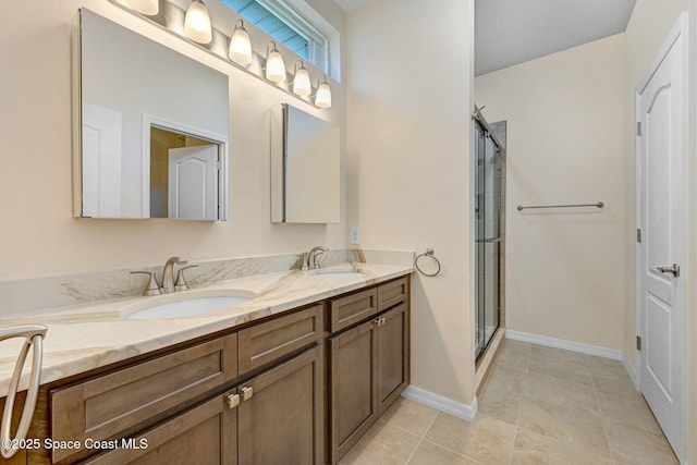 full bath featuring tile patterned flooring, double vanity, a stall shower, and a sink