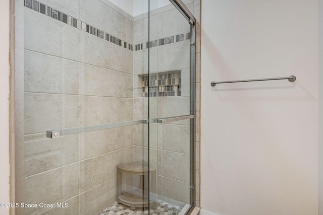 full bath featuring a stall shower