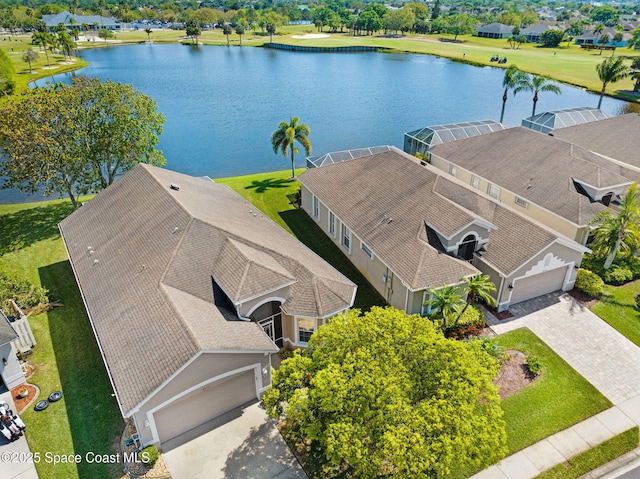 aerial view with a water view and a residential view