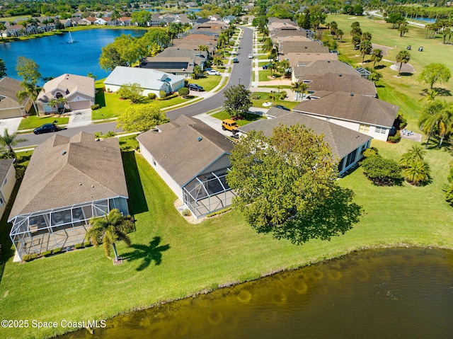 birds eye view of property featuring a residential view and a water view