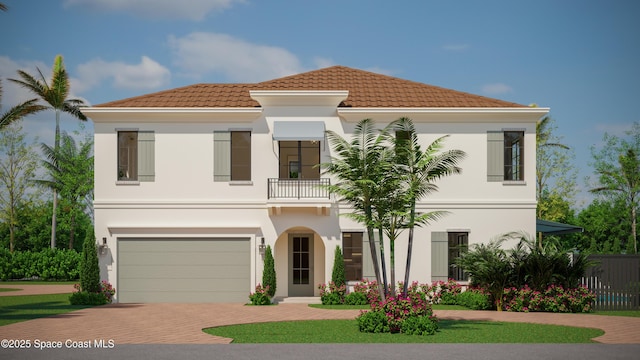 mediterranean / spanish home featuring decorative driveway, a balcony, an attached garage, and stucco siding