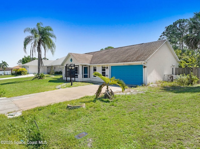 view of front of home featuring a garage, concrete driveway, fence, a front lawn, and stucco siding