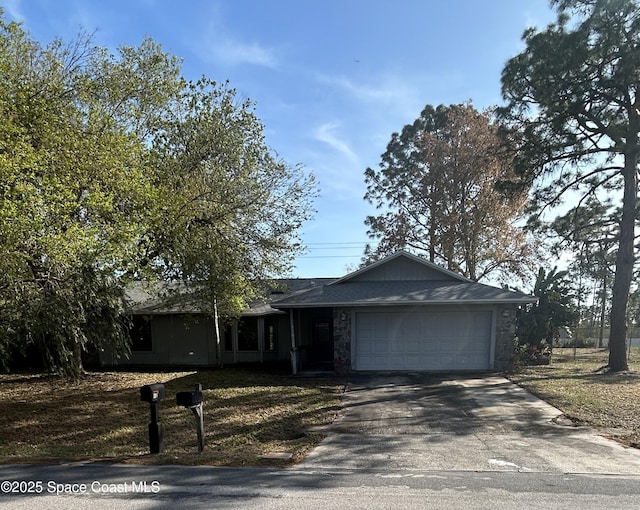 ranch-style house featuring an attached garage, stone siding, concrete driveway, and roof with shingles