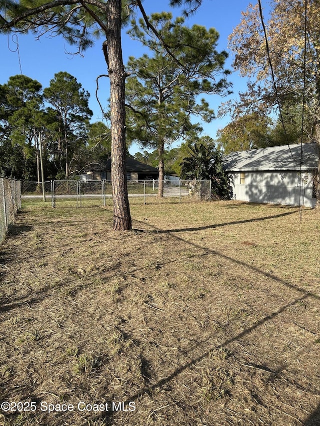 view of yard with fence