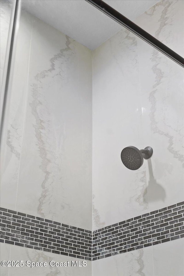 interior details with a shower