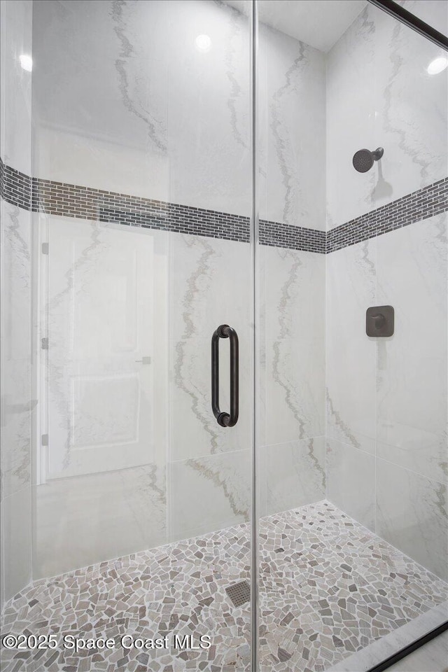 full bath featuring a stall shower