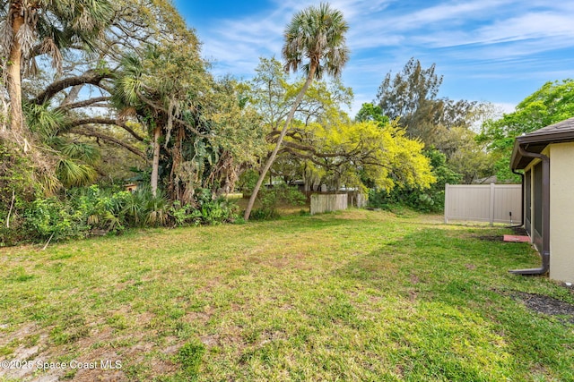 view of yard featuring fence