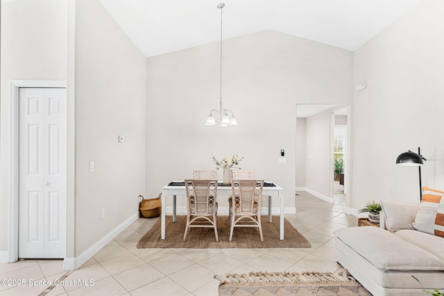 dining room featuring a chandelier, high vaulted ceiling, baseboards, and light tile patterned floors