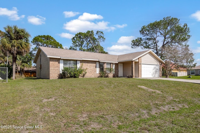 ranch-style house featuring a front yard, brick siding, driveway, and an attached garage