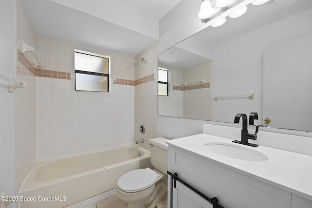 bathroom with toilet, shower / bathing tub combination, and vanity