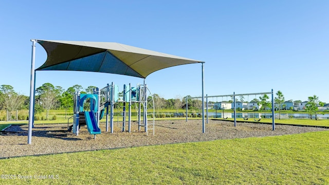 community playground featuring a water view