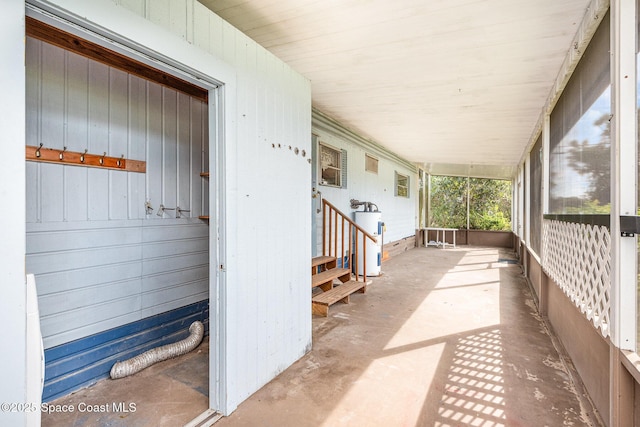 view of patio / terrace featuring water heater