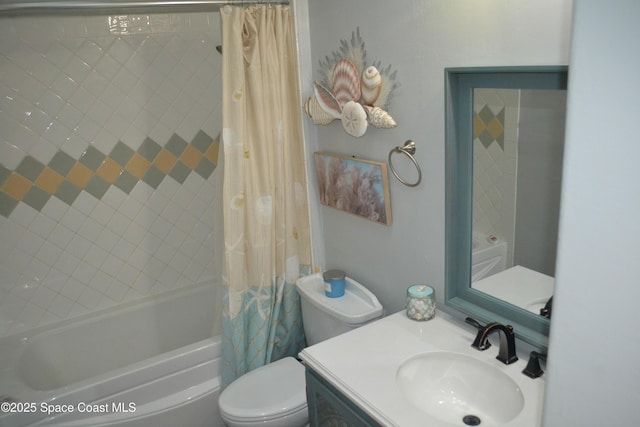 full bath with vanity, toilet, and shower / bath combo with shower curtain