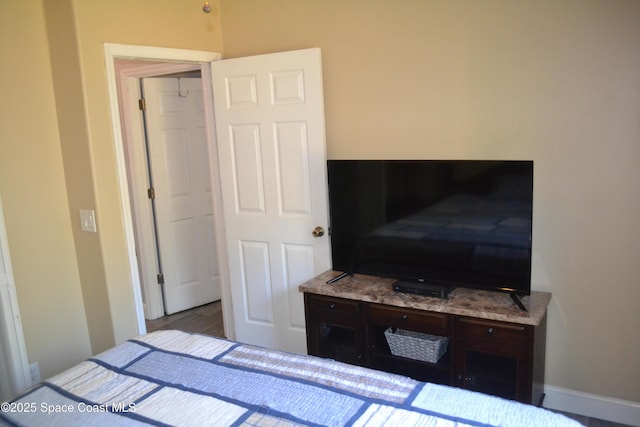 bedroom with baseboards