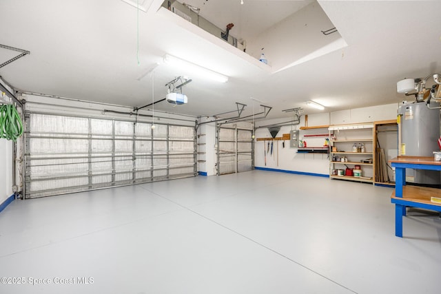 garage featuring electric panel, water heater, and a garage door opener