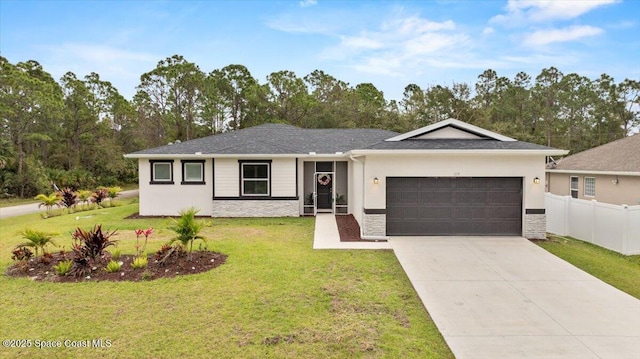 ranch-style house with a garage, concrete driveway, a front yard, and fence