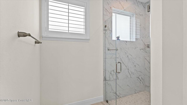 full bath with a marble finish shower